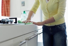 Woman wiping Counter